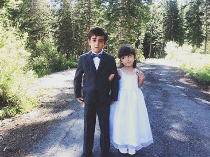 Children were at the wedding, though they were seated in a different section and may have been served different food